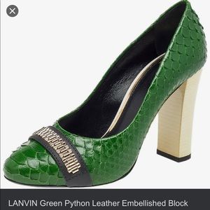 ISO Green Python pumps with gold chain trim and ivory heel.